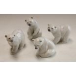 A set of four Lladro polar bears