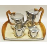 A retro Picquot tea service comprising teapot, water pot ,