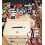 Photography interest - a Kodak Compur bellows camera; a Braun Paxette 35mm camera;