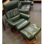 An Ekornes Stressless reclining armchair and foot stool.