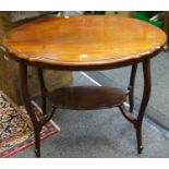 An Edwardian mahogany centre table with undertier