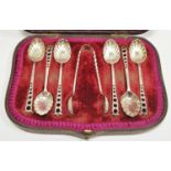 A Victorian silver pierced presentation set teaspoons and sugar nips hallmarked Atkin Brothers