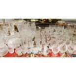 Crystal and cut glass including five Waterford liqueur glasses, decanters, brandy balloons,