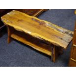A Naturalistically formed yew wood garden/conservatory table,