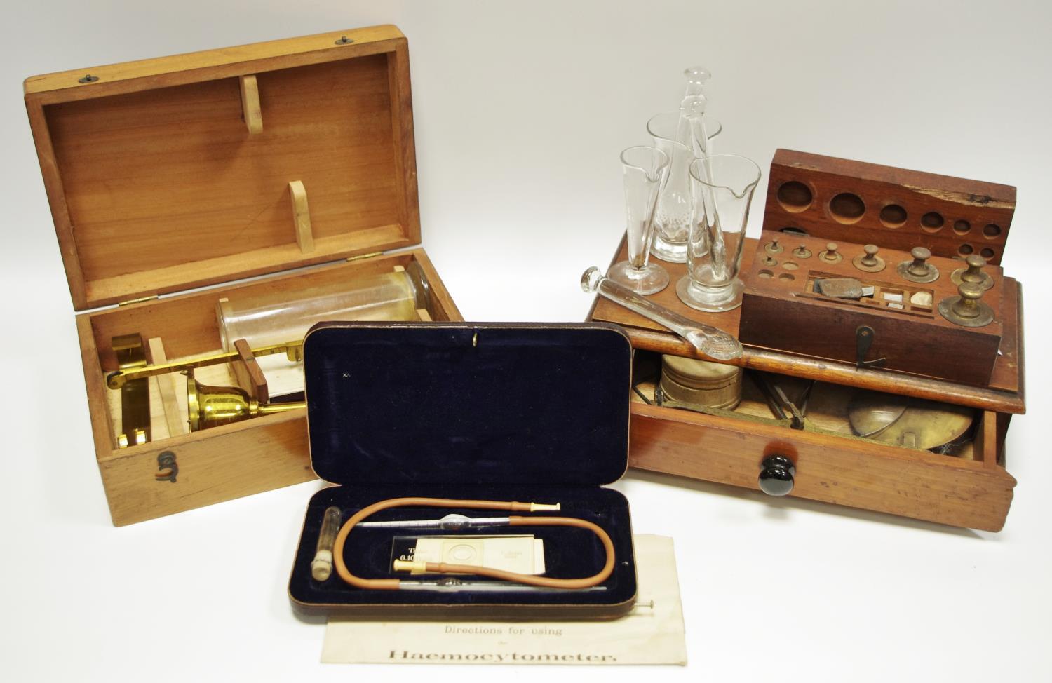 Scientific instruments including an early 20th century brass Chondrometer, cased; a Carl Zeiss,