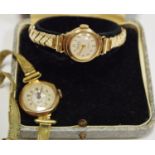 Two 9ct gold lady's wristwatches, one with 9ct gold metal core linked bracelet,