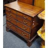 A George III mahogany chest, cross banded top, four cockbeaded graduated drawers, swan neck handles,