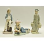 Lladro - ''All Aboard'' figure of a boy with train, printed marks to base, pattern number 7619,