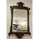 A early 19th century mahogany Vauxhall mirror; a contemporary three panel dressing table mirror;