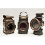 A Lucas C332 sentry oil lamp; a Lucas No F141 long's own oil lamp;