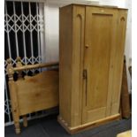 A Country house pine wardrobe;