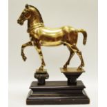 Equestrian Interest - A Victorian bronze model of a Hanoverian in Piaffe,