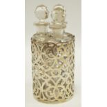 An early 20th century silver three section scent flask suite,