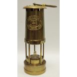 A Thomas & Williams brass miners lamp, the Cambrian No.