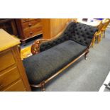 A Victorian mahogany chaise, button upholstery, ceramic casters.