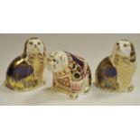 A Royal Crown Derby King Charles Spaniel paperweight, first quality, boxed; another, a Bulldog,