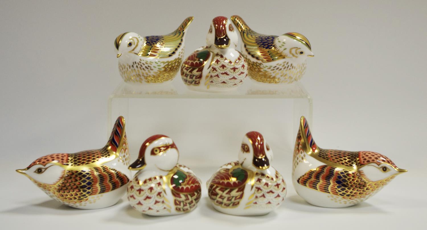 A couple of Royal Crown Derby paperweights Fire Crest; another couple similar;