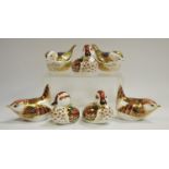 A couple of Royal Crown Derby paperweights Fire Crest; another couple similar;