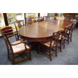 A Regency style mahogany D-end pedestal dining table (two leaves);