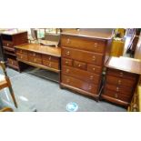 A Stag Minstrel bedroom suite comprising dressing table, chest of drawers, two bedside tables,