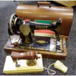 An early 20th century Singer sewing machine (with key); Holly Hobble,