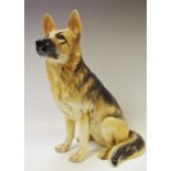 A large recumbent Goebel German shepherd model,