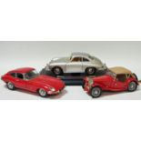 A Franklin Mint 1961 Jaguar E-Type FHC, red body, black interior boxed; another 1948 MG TC,