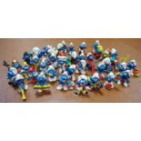 Smurfs, approx 39 Peyo / Schleich Smurfs c1980/90's including cyclist, skier, boxer, King,