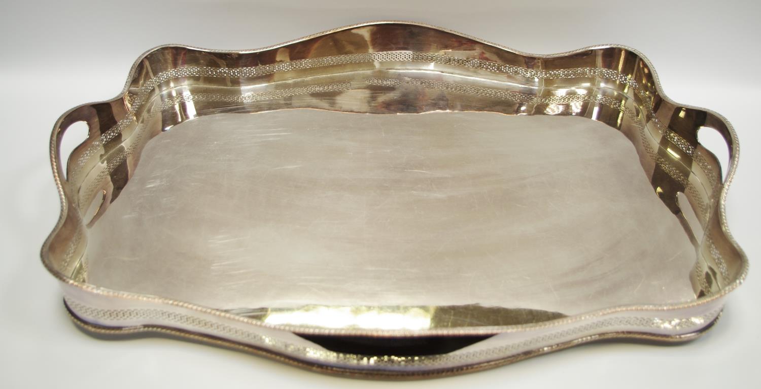 A substantial silver plated shaped gallery tray pierced fretwork edge