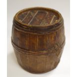 A Bretby tobacco jar in the form of a barrel