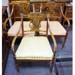Three painted satinwood regency style open arm chairs,