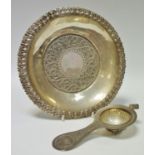 An Eastern white metal cabinet plate,