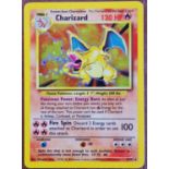 Pokemon cards - 1990's shiny holofoil Charizard illustrated by Mitsuhiro Arita by Nintendo and