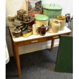 A Retro Mid 20th century kitchen table holding two drawers to frieze; enamel bread bin;