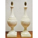 A pair of Carrera marble lamp bases