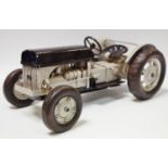 A tinplate Massey Ferguson System tractor possibly Jayland, grey body, black hood, chassis,