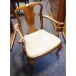 A Regency walnut and mahogany open hall chair c.