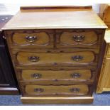 A Victorian mahogany chest of drawers, galleried back, two short over three graduated long,