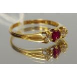 An 18ct gold diamond & ruby trilogy ring size S, 3.