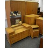A mid-20th century Lebus Link six piece bedroom suite comprising two wardrobes, dressing table,