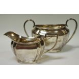 A silver sucrier and creamer, Birmingham 1931,