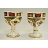 A pair of Royal Crown Derby Old Imari 1128 goblets, 12cm high, printed mark.
