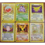 Pokemon cards - ten holofoil shiny edition 1990's collector cards including Dark Weezing, lasoise,
