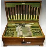 A comprehensive canteen of Waller and Hall cutlery, oak case,
