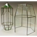 An early 20th century clear and emerald stained glass ceiling terrarium;