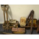 A quantity of tools and boxes to include gardening tools, a plane, a tripod,