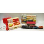 A Marx (British) automatic Switcher train set, comprising 060 locomotive with light and tender,