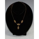 A 9ct gold necklace, suspended with four engraved oval panels, 8.4g