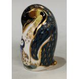 A Royal Crown Derby paperweight, Penguin and Chick, printed marks to base, gold stopper, unboxed