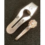 A Victorian silver napkin slide clip, Hilliard & Thomason, Birmingham 1882; another smaller, James